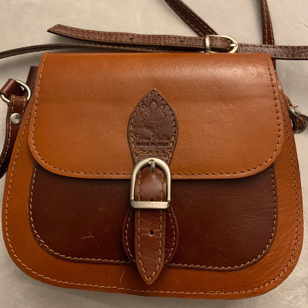 Lightly used brown leather saddle bag
